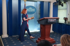 The White House Press Secretary Jen Psaki walks into the White House Press Room. Model: ILCE-1 | Lens: FE 24-70mm F2.8 GM II | Focal Length: 37 | F-Stop: 2.8 | Shutter Speed: 1/400 | ISO: 1600Photography by Nick Didlick 2022