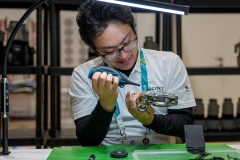 Hiroto Ogawa works on a camera at the Sony Service Centre in Milan at the Milan Cortina 2026 Winter Olympics.