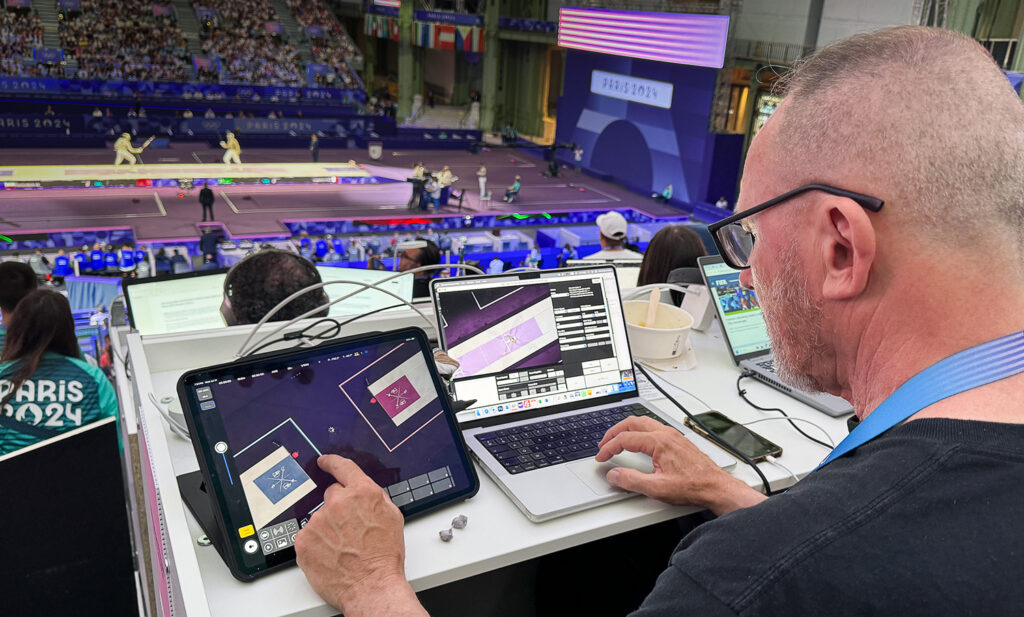 The Associated Presses Christophe Enya operates a robotic camera in the Paris 2024 Fencing Venue. Photo by Nick Didlick